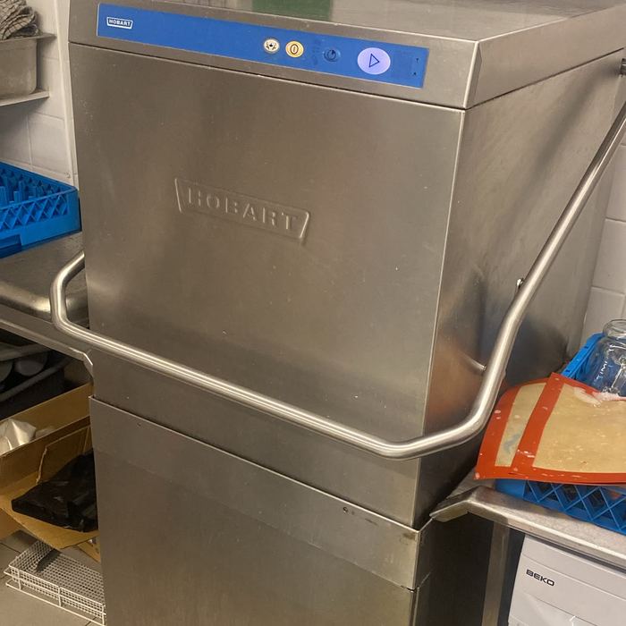Hobart commercial dishwasher in a restaurant kitchen